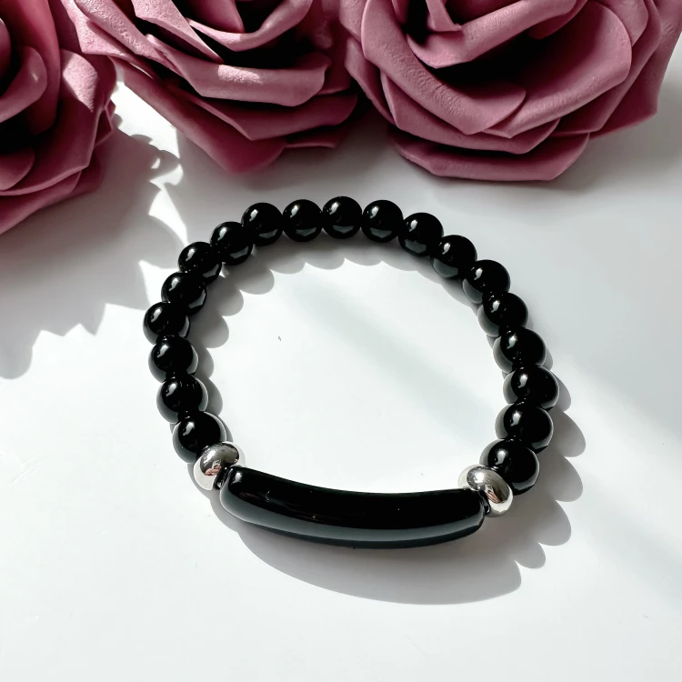 Bransoletka damska z kamieni naturalnych Onyks podłużny kule 8 mm