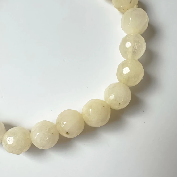 Bransoletka damska z kamieni naturalnych faset kremowy Jadeit kule 8 mm