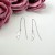 Kolczyki przeciągane srebrne piórka na łańcuszku ze stali chirurgicznej